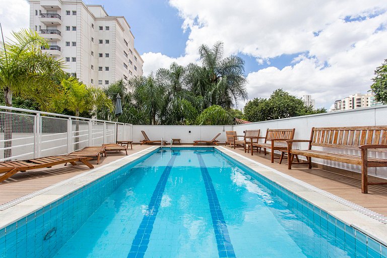 Wehome -Duplex: churrasqueira e vista da cidade.