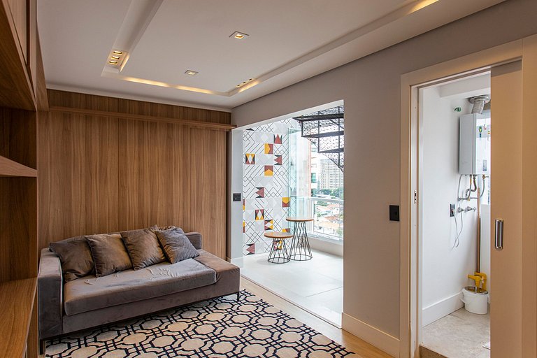 Wehome -Duplex: churrasqueira e vista da cidade.
