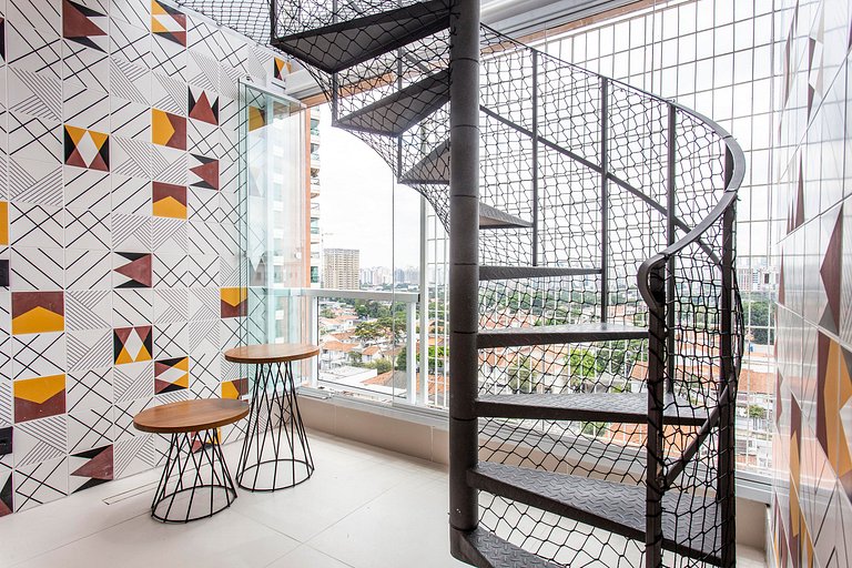 Wehome -Duplex: churrasqueira e vista da cidade.