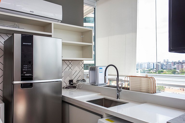 Wehome -Duplex: churrasqueira e vista da cidade.