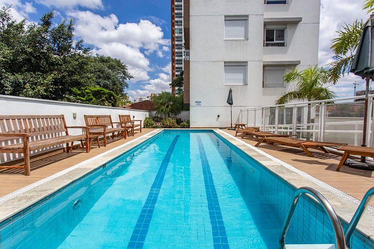 Wehome -Duplex: churrasqueira e vista da cidade.